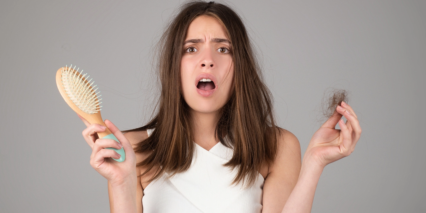 Hair Loss in Women: Causes, Treatment & Prevention